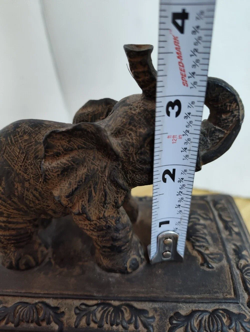 Ornate elephant trinket/jewelry box with raised elephant lid, floral relief desi